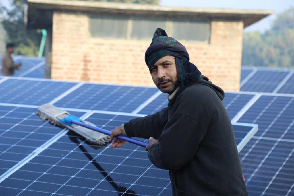 solar panel cleaning with safety equipment 